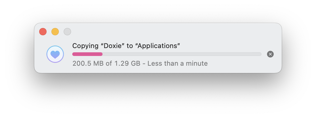 A light gray box with black text that says Copying Doxie to Applications. There is a pink loading bar underneath the text monitoring the progress.